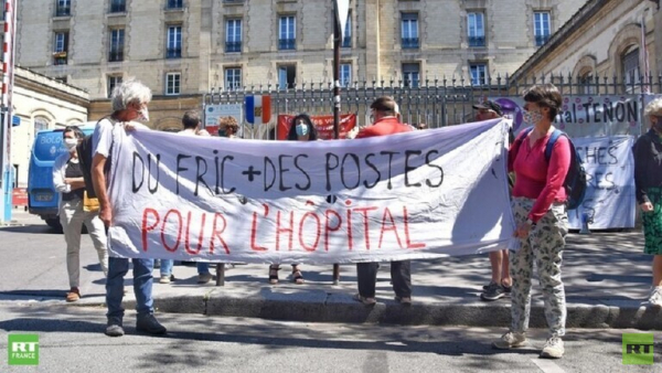 عاملون بقطاع الصحة في فرنسا: نريد أسرة وأموالاً لا أوسمة