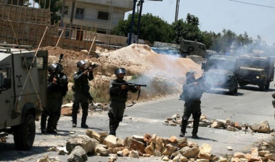 الاحتلال يقمع مسيرة منددة بالاستيطان شرق رام الله