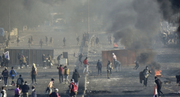 تجدد الصدامات بين المتظاهرين والقوات الأمنية في النجف